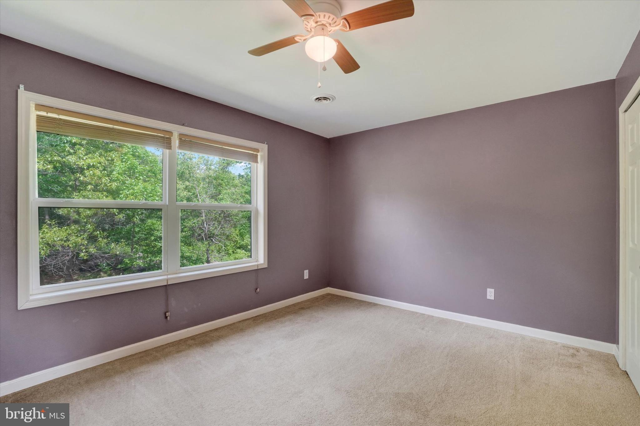 1055 Copenhaffer Road York, PA 17404 - Photo 9 of 38 an empty room with a window and a fan