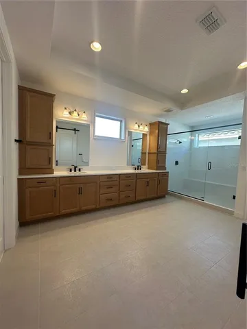 a view of a kitchen with a sink and cabinet area