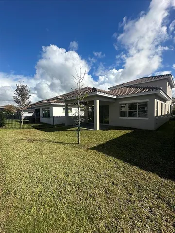 a view of a house with a garden