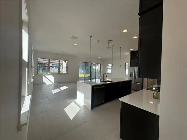 a large kitchen with a counter space