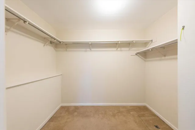 a view of an empty walk in closet