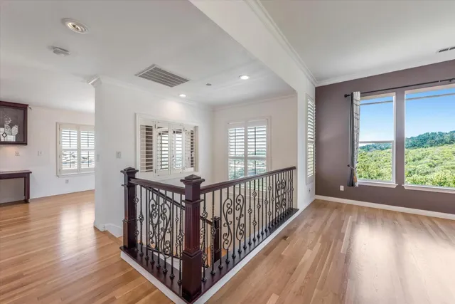 a view of entryway with wooden floor