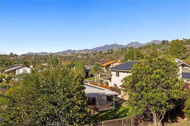 an aerial view of residential house with an outdoor space