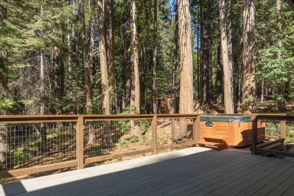 a view of a big house with a big yard