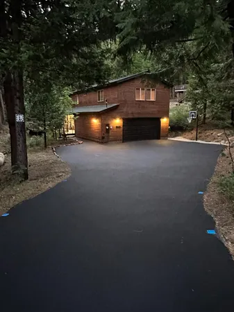 a view of a street with a tree