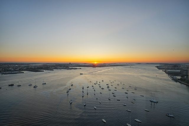 a view of a ocean with a nearby beach