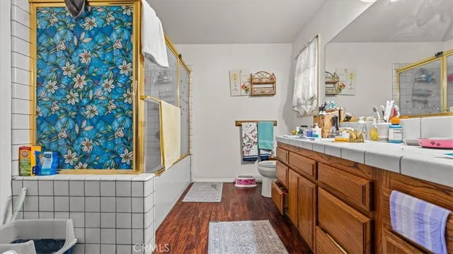 a bathroom with a sink and a shower curtain