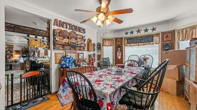 a view of a dining room and hall with furniture