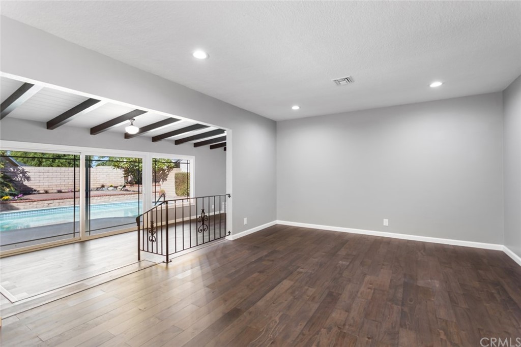 421 Catalpa Avenue Brea, CA 92821 - Photo 7 of 27 a view of a kitchen with wooden floor and electronic appliances