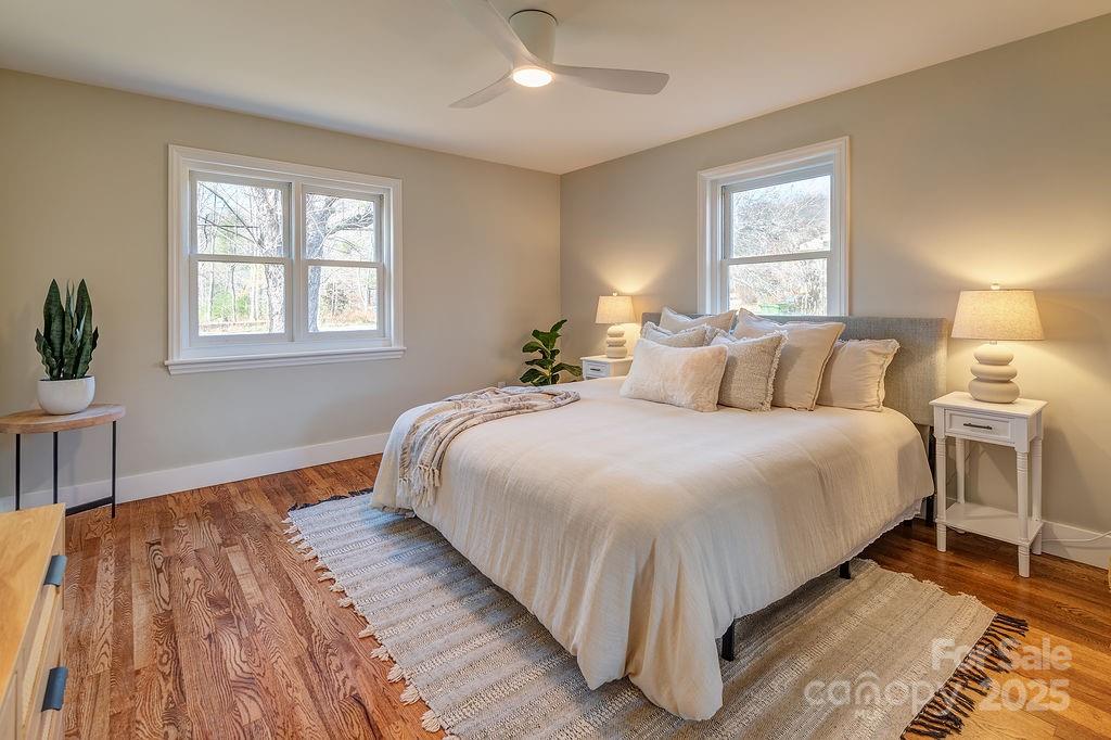 55 Cisco Road Asheville, NC 28805 - Photo 17 of 38 a bedroom with a large bed and a window