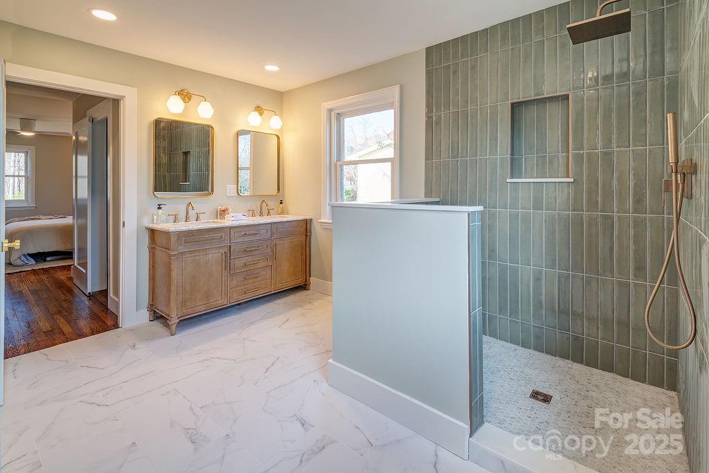 55 Cisco Road Asheville, NC 28805 - Photo 20 of 38 a bathroom with a tub sink and mirror