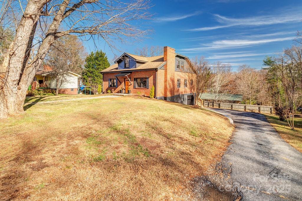 55 Cisco Road Asheville, NC 28805 - Photo 2 of 38 a view of a house with a yard