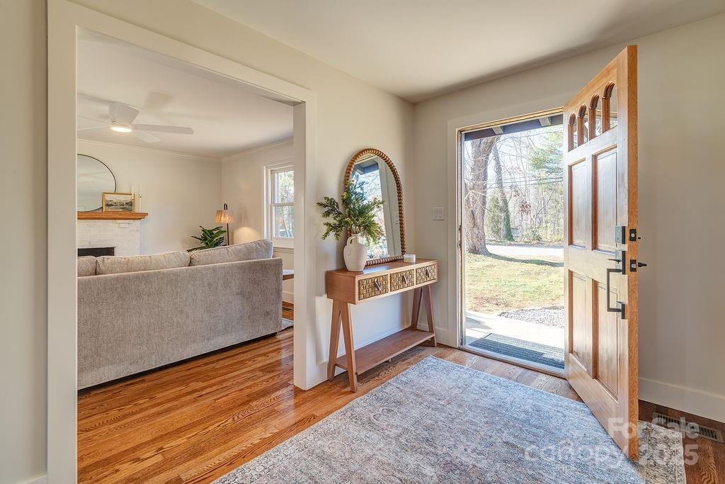 55 Cisco Road Asheville, NC 28805 - Photo 3 of 38 a view of a room with window and hardwood floor
