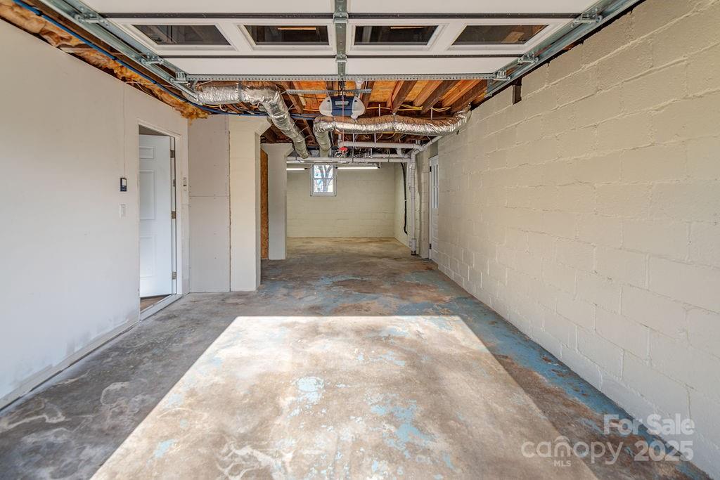 55 Cisco Road Asheville, NC 28805 - Photo 31 of 38 a view of a hallway with a garage