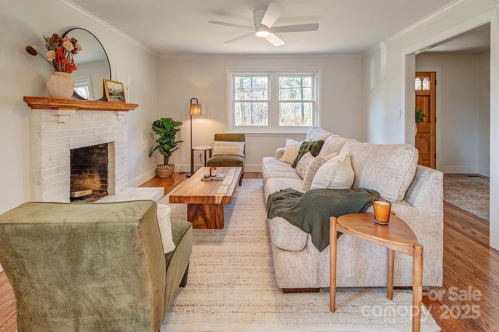 55 Cisco Road Asheville, NC 28805 - Photo 7 of 38 a living room with furniture and a fireplace