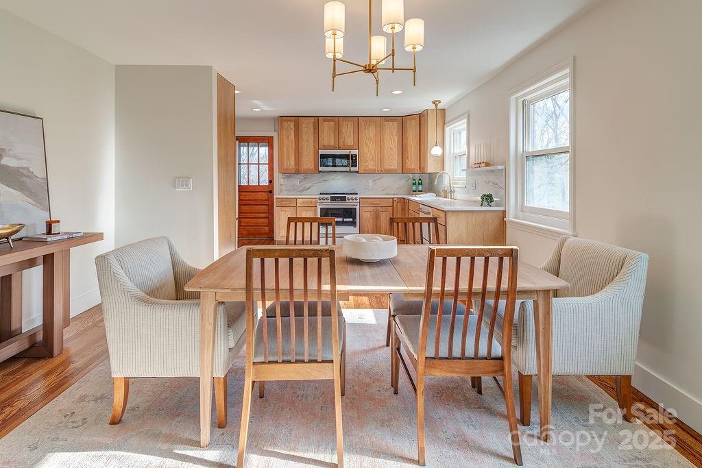 55 Cisco Road Asheville, NC 28805 - Photo 9 of 38 a view of a dining room with furniture