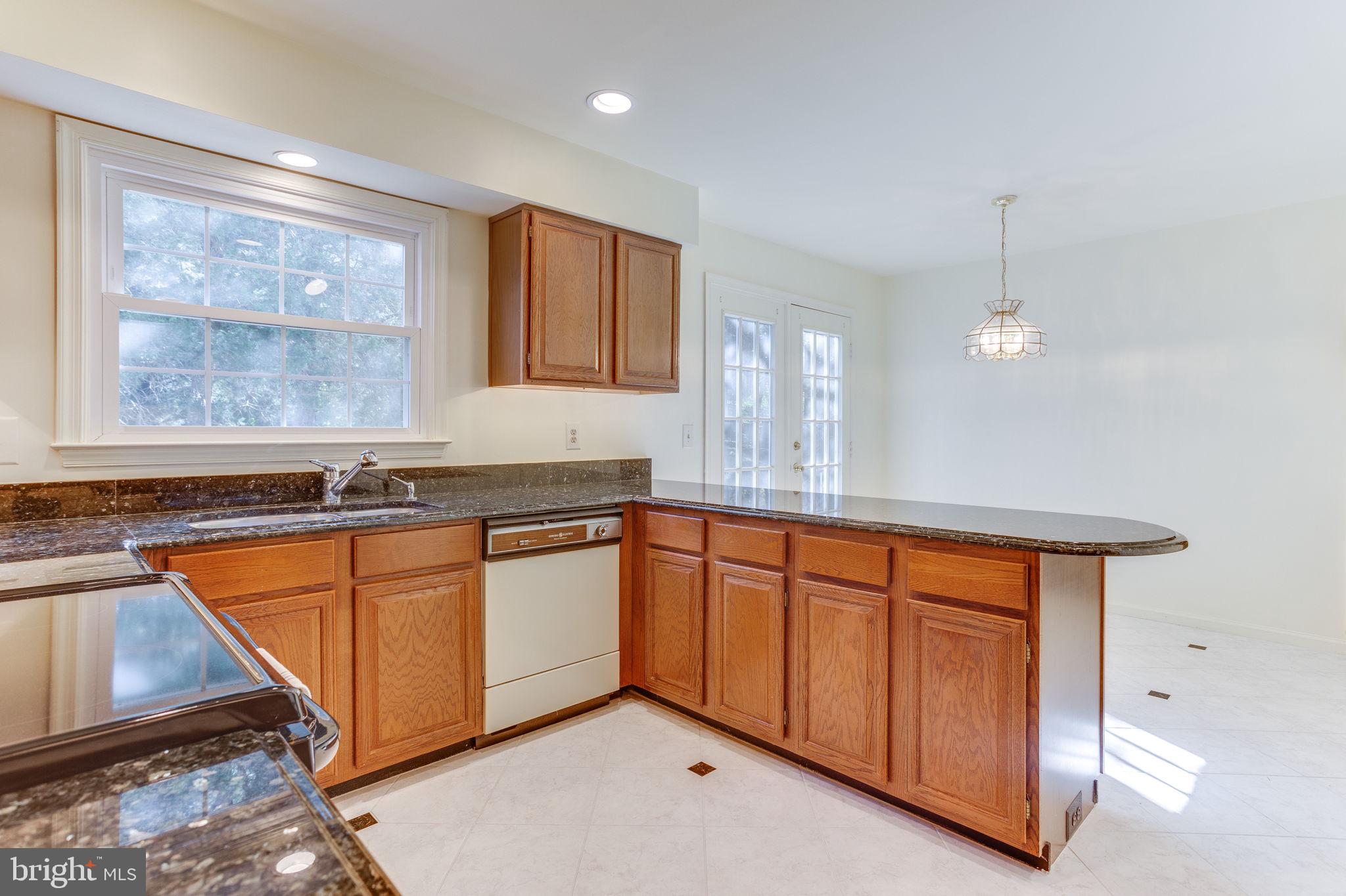 160 Peyton Road Sterling, VA 20165 - Photo 15 of 44 Tile floor in kitchen and eat in space