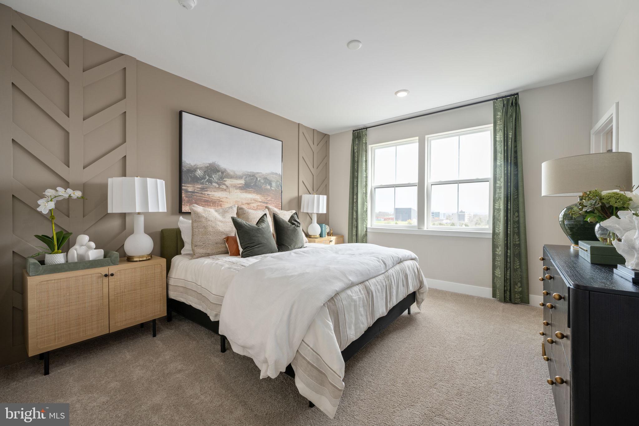 11367 Hypatia Loop Manassas, VA 20110 - Photo 39 of 80 a spacious bedroom with two beds and potted plant
