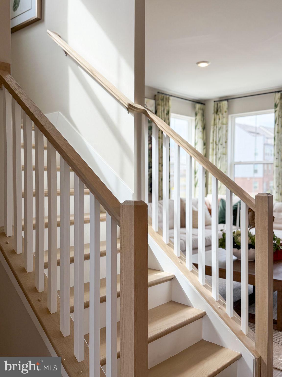11367 Hypatia Loop Manassas, VA 20110 - Photo 49 of 80 a view of staircase with lots of white walls and a window