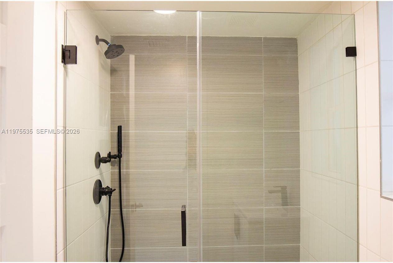 1000 7th Street Miami Beach, FL 33139 - Photo 17 of 36 a bathroom with a shower