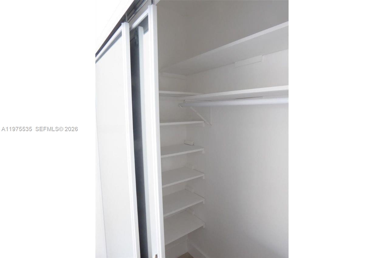 1000 7th Street Miami Beach, FL 33139 - Photo 20 of 36 a picture of a room with a door