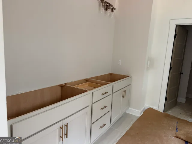 a front view of a house with yard porch and green space