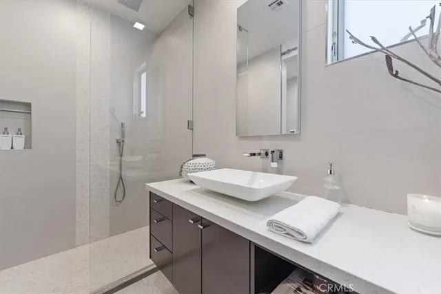 a bathroom with a sink toilet and vanity