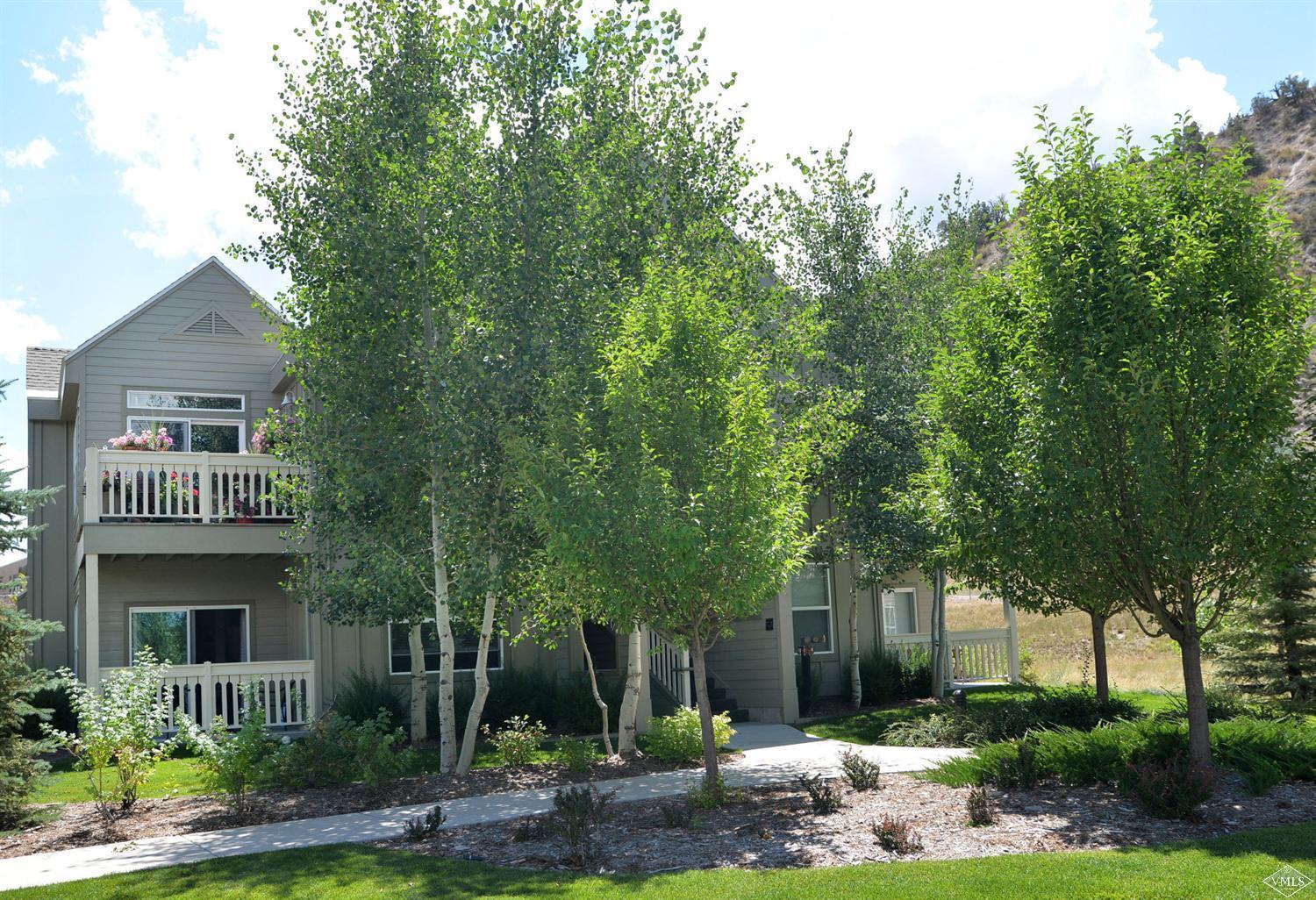 80 Freestone Road, Unit B201 Eagle, CO 81631 - Photo 15 of 15 a front view of a house with garden