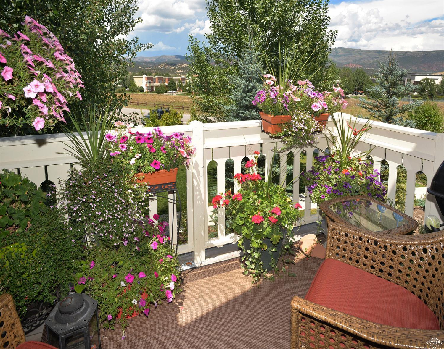 80 Freestone Road, Unit B201 Eagle, CO 81631 - Photo 2 of 15 a bunch of flowers are in a garden