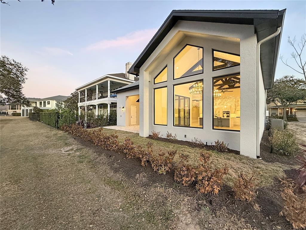 7394 Gathering Court Reunion, FL 34747 - Photo 33 of 44 a view of a house with a yard
