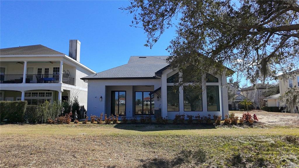 7394 Gathering Court Reunion, FL 34747 - Photo 35 of 44 a front view of a house with garden