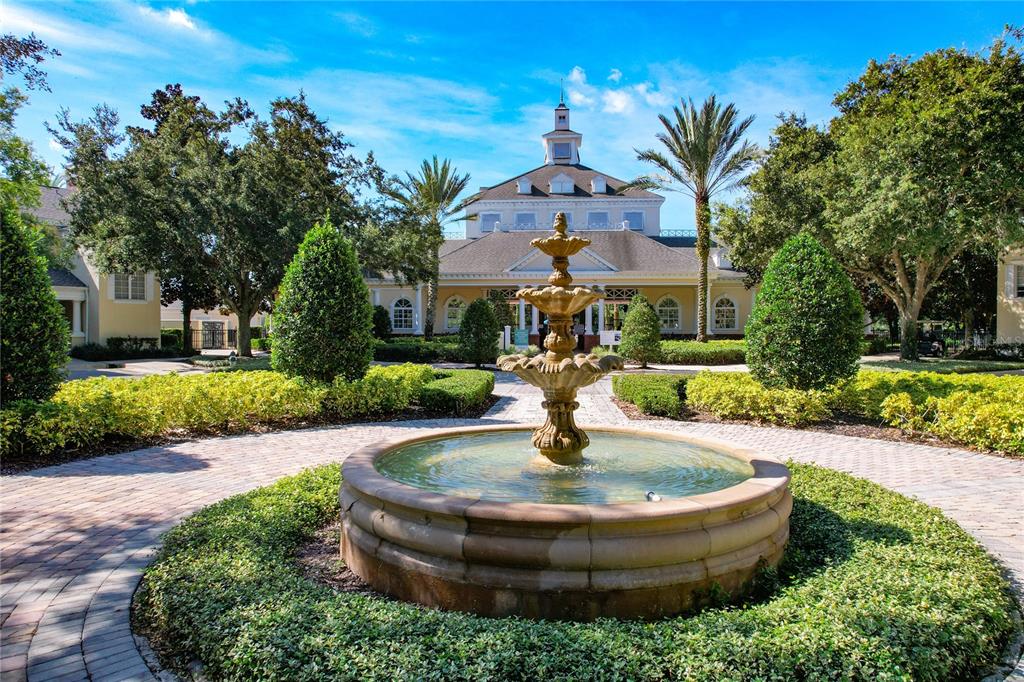 7394 Gathering Court Reunion, FL 34747 - Photo 41 of 44 a front view of a house with a fountain