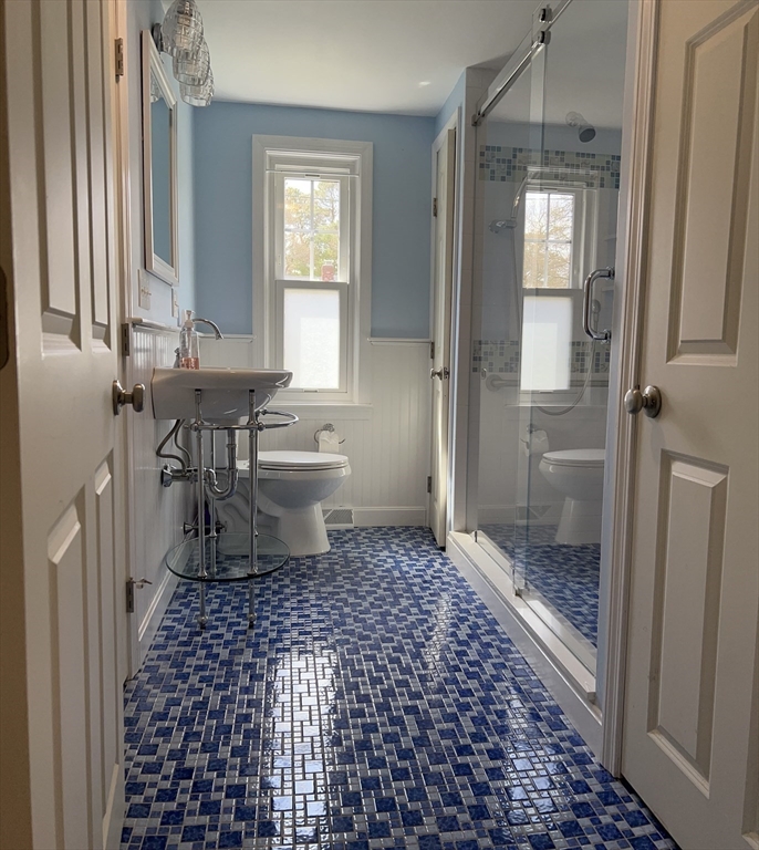 32 Westminster Road Centerville, MA 02632 - Photo 13 of 23 a bathroom with a sink a toilet and a shower