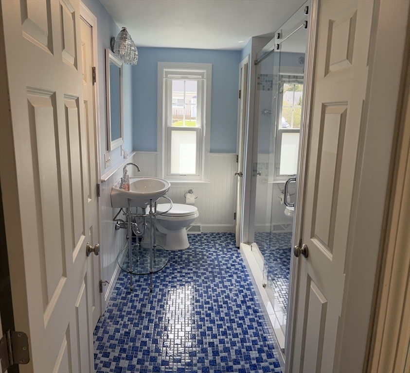 32 Westminster Road Centerville, MA 02632 - Photo 14 of 23 a bathroom with a sink toilet and shower