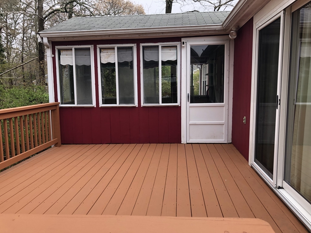32 Westminster Road Centerville, MA 02632 - Photo 3 of 23 a view of balcony with wooden floor