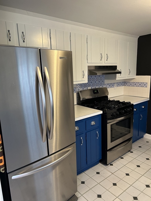 32 Westminster Road Centerville, MA 02632 - Photo 10 of 23 a kitchen with stainless steel appliances a refrigerator sink and cabinets