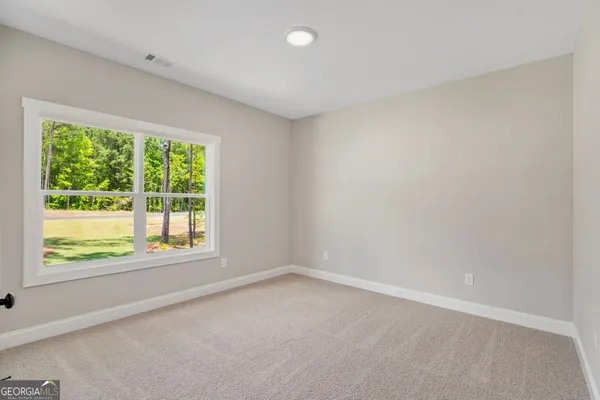 an empty room with a window