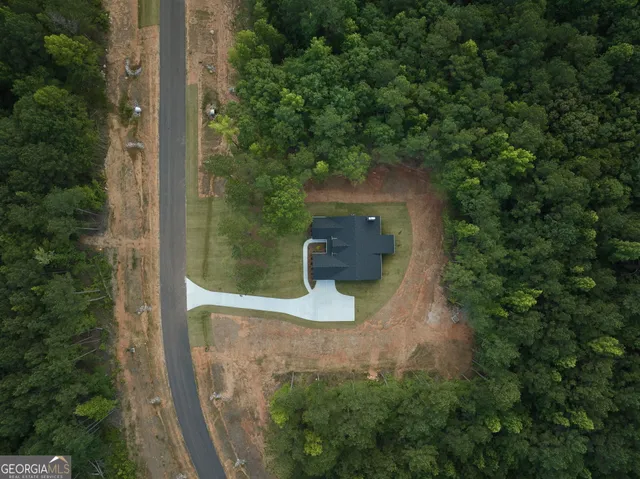 an aerial view of a residential houses