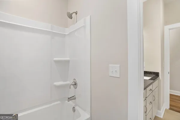 a bathroom with a bathtub