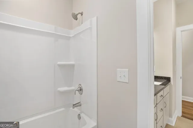 a bathroom with a bathtub