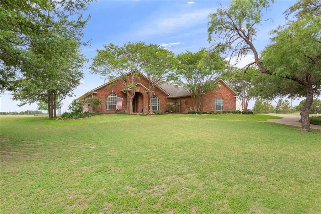 6008 Mesquite Tree Court Waco, TX 76708 - Photo 4 of 39 Huge well established trees on circle front driveway