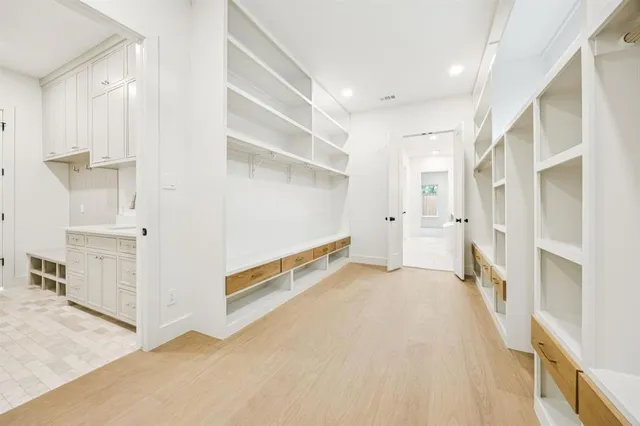 a view of a hallway with staircase