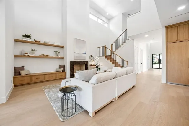 a living room with furniture and a table