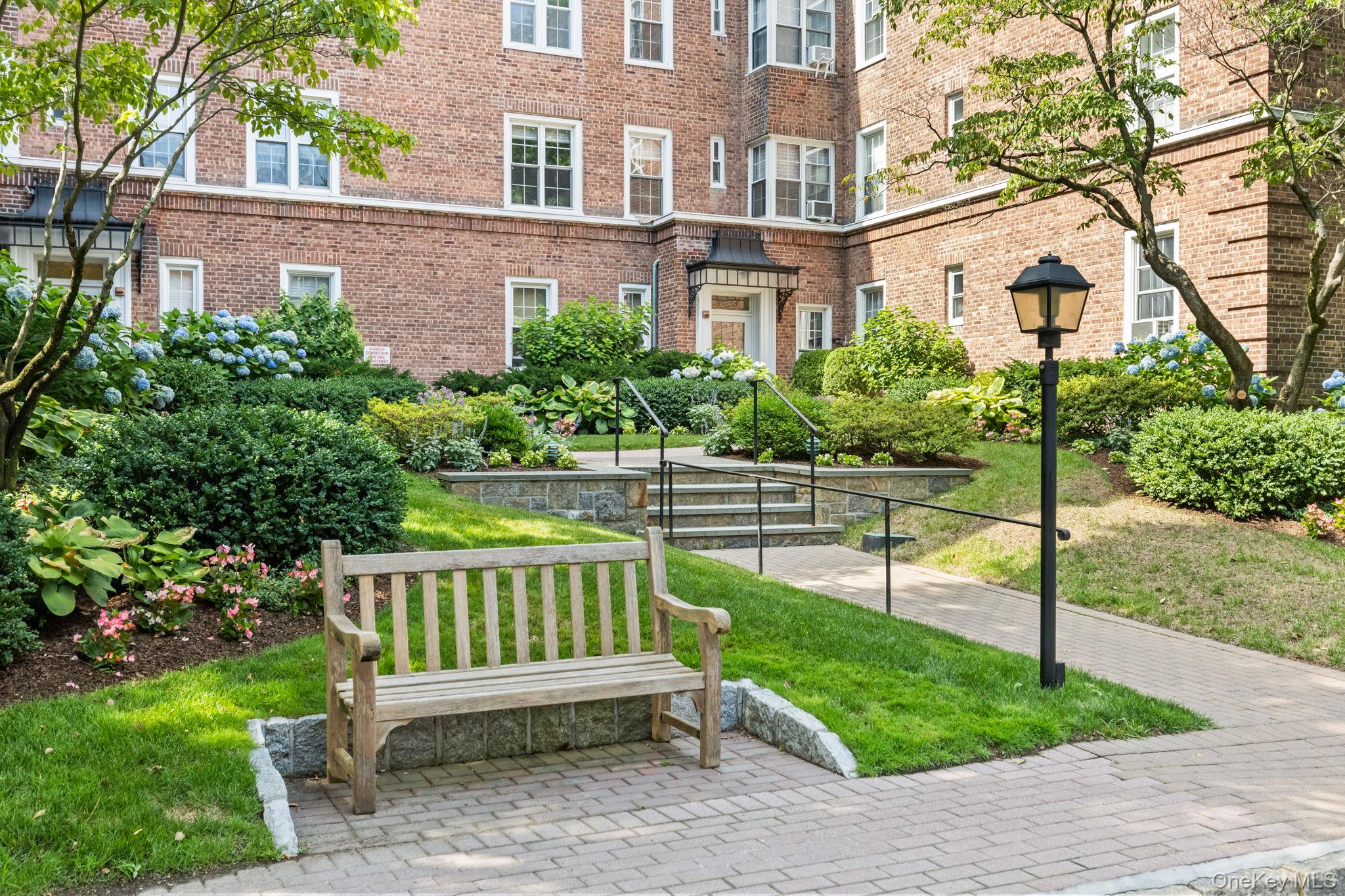 a view of a chair and table in the yard