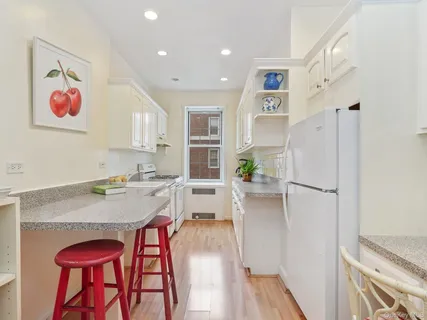 a spacious bedroom with a bed and a table