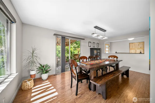 a workspace with furniture window and wooden floor