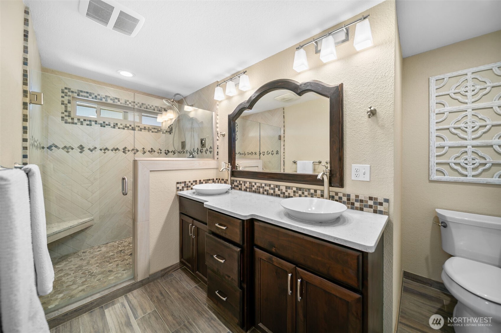 1901 Sleepy Hollow Road Wenatchee, WA 98801 - Photo 20 of 40 a bathroom with a granite countertop sink mirror vanity and toilet