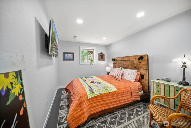 a bedroom with a bed and furniture