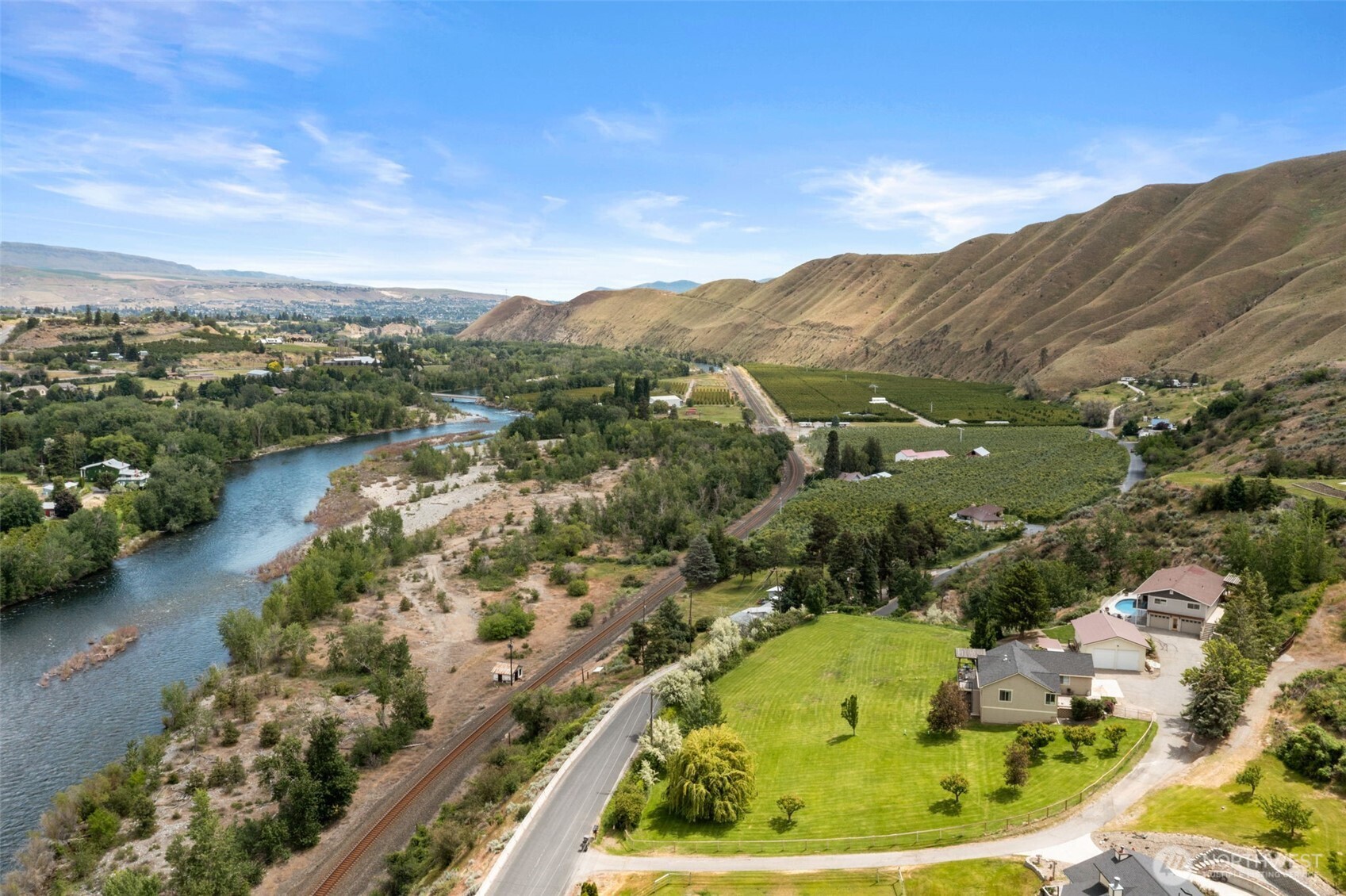 1901 Sleepy Hollow Road Wenatchee, WA 98801 - Photo 3 of 40 an aerial view of residential houses with outdoor space and trees