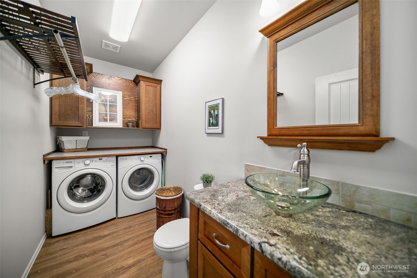 1901 Sleepy Hollow Road Wenatchee, WA 98801 - Photo 36 of 40 a bathroom with a granite countertop sink and a mirror